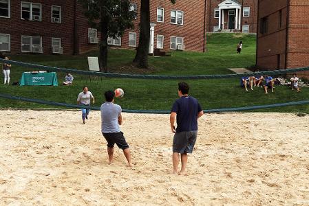 Students playing volleyball