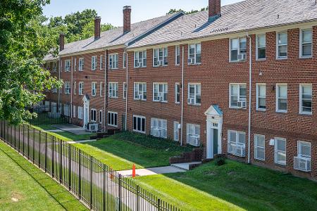 Seton Court rear exterior with a metal fence
