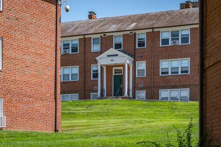 Seton Court front exterior with wide open lawn